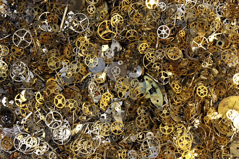 pile of watch gears and cogs