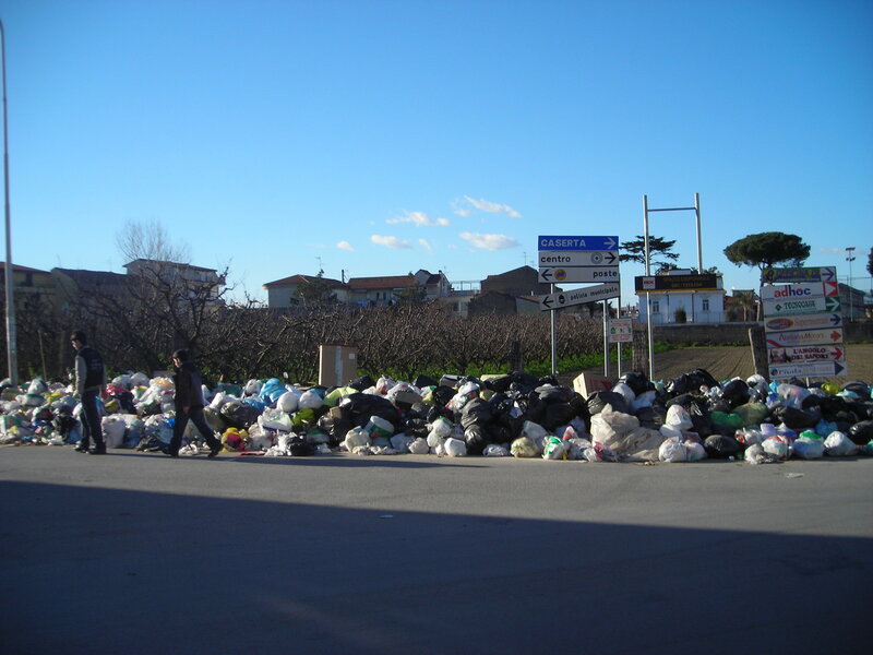 Piles of trash on a roadside