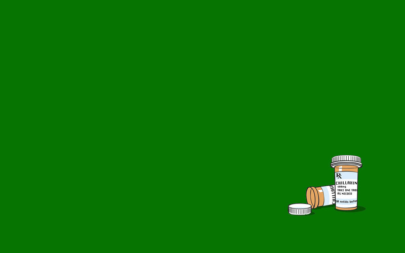 pill bottles on green background