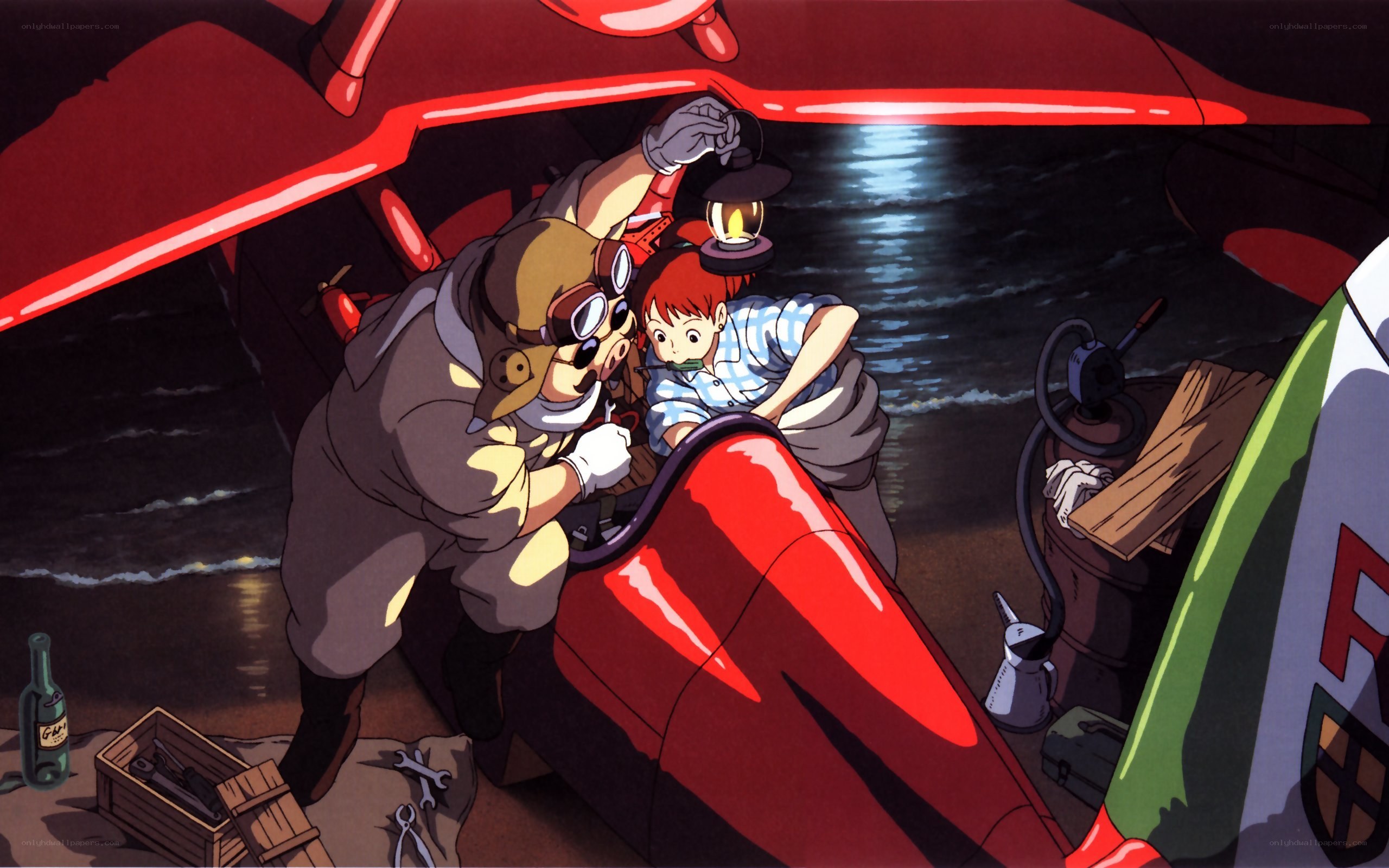 Pilot and child with red aircraft