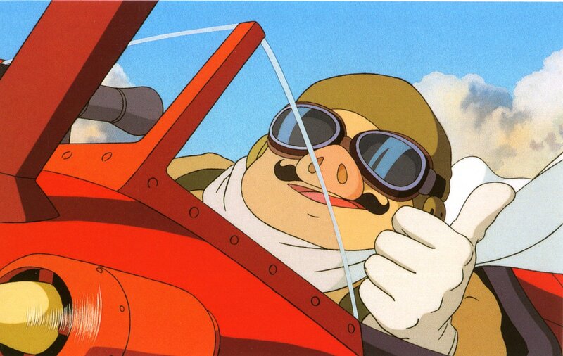 pilot giving thumbs up in cockpit