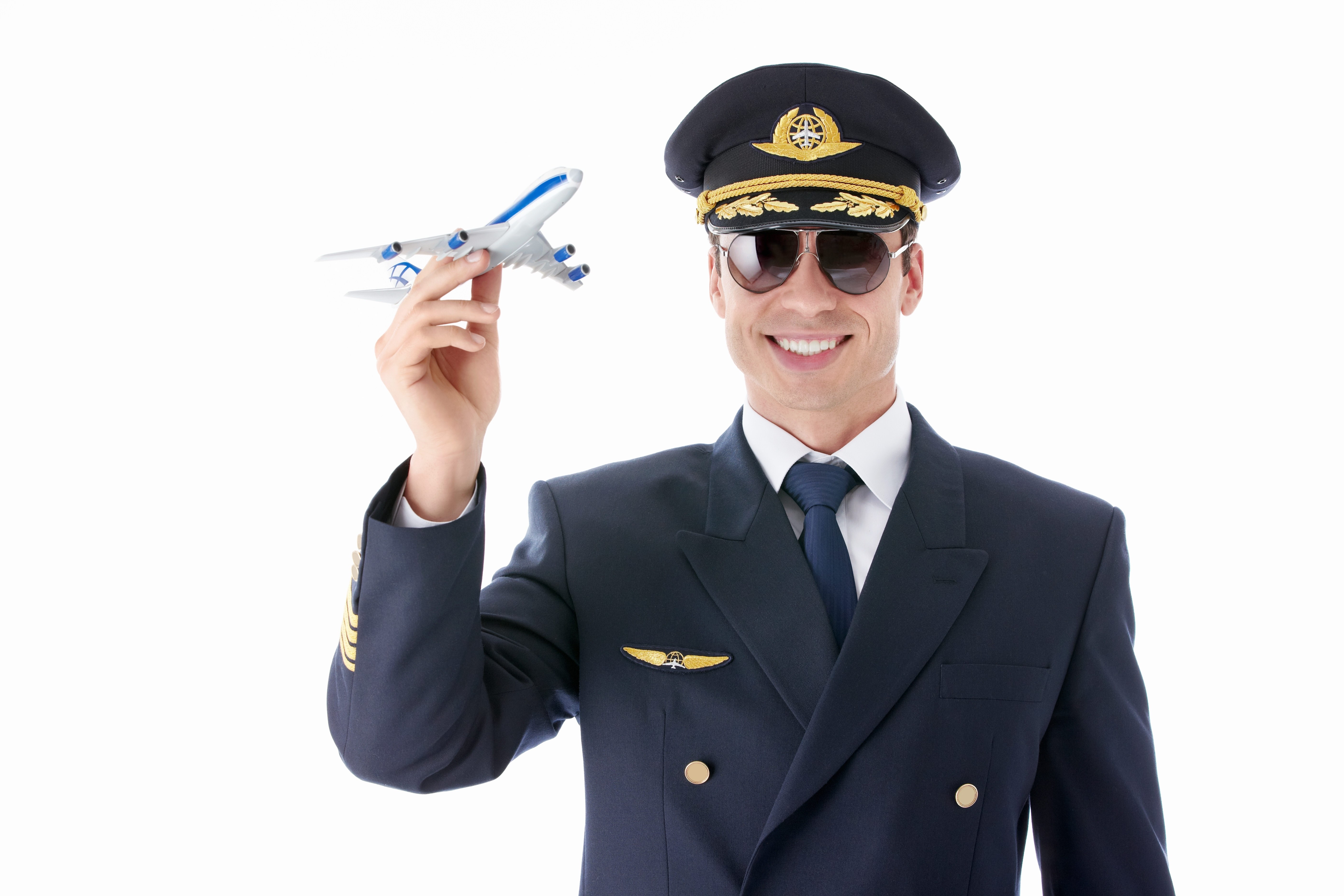 pilot holding toy airplane