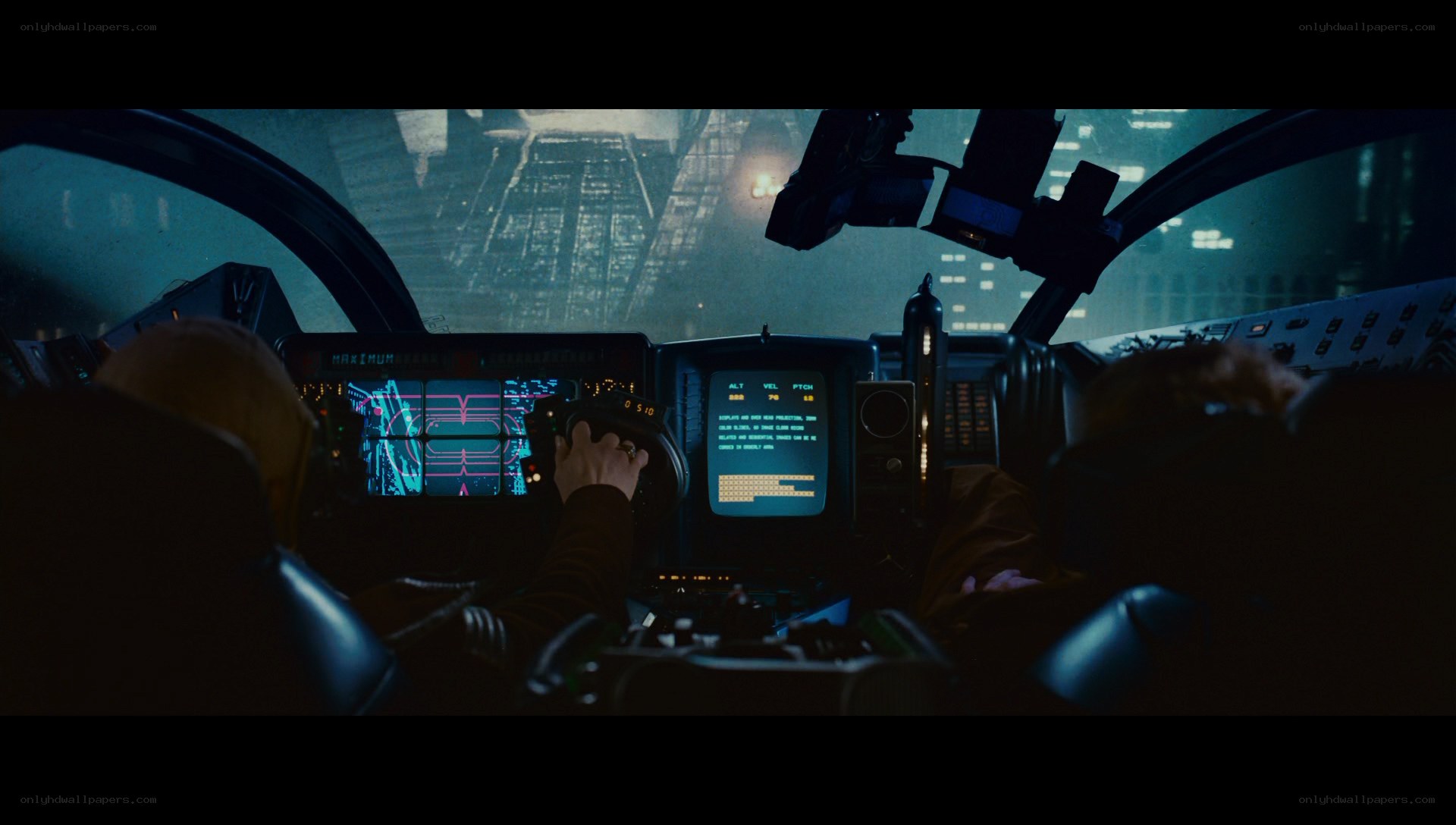 pilot in cockpit at night