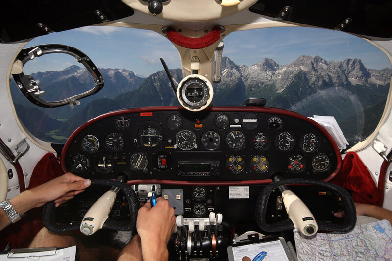 Pilot in Cockpit — Black, Calm, Afternoon