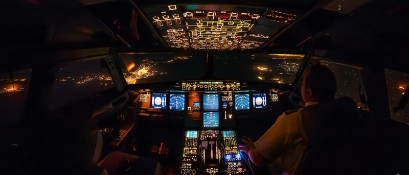 Pilot in Cockpit — Black, Dark