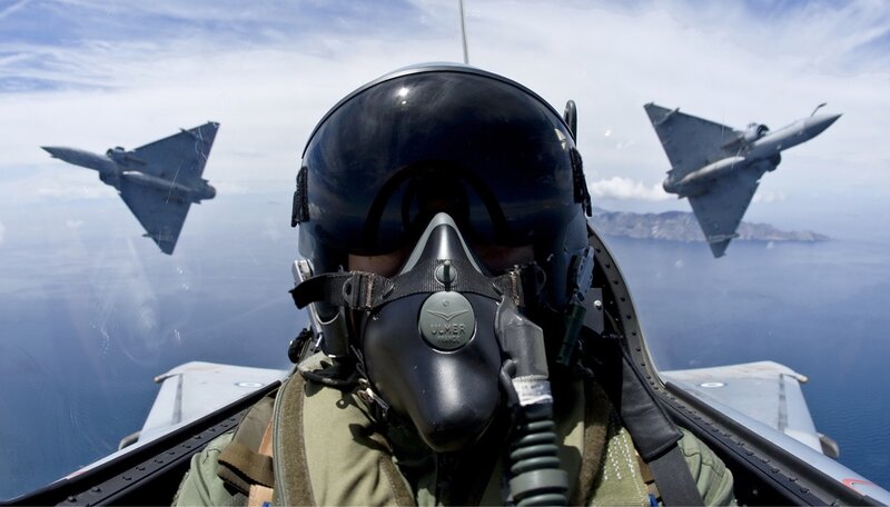 Pilot in Cockpit — Blue, Dramatic, Afternoon, Photograph
