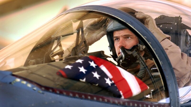 Pilot in Cockpit — Blue, Focused