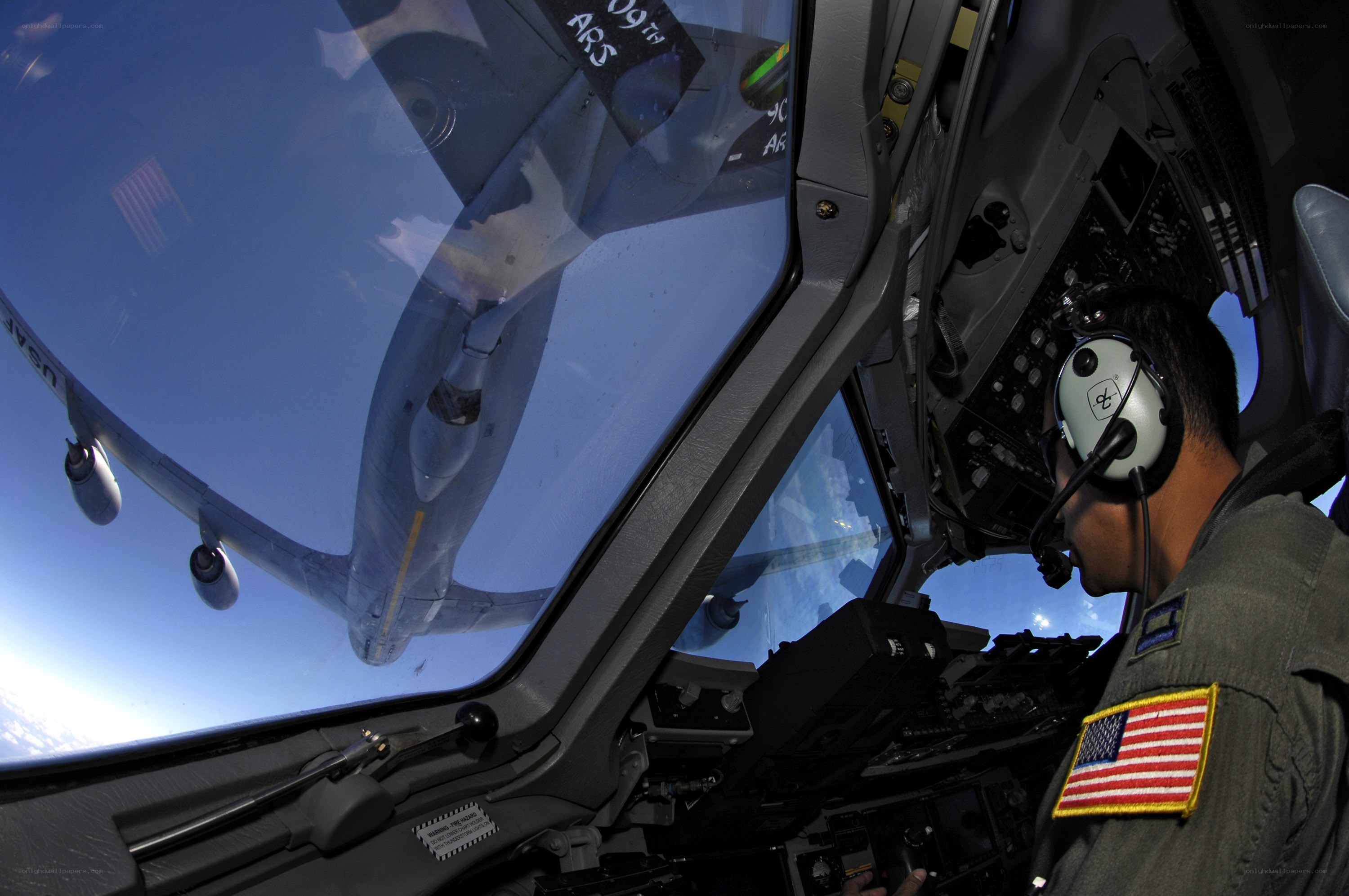 Pilot in cockpit during flight