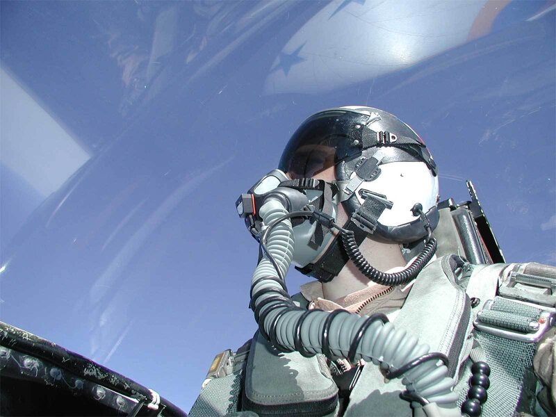 pilot in cockpit during flight