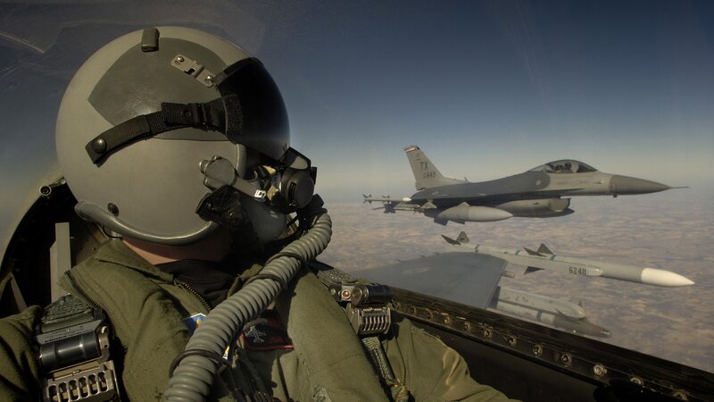Pilot in Cockpit — Gray, Dramatic, Afternoon, Photograph