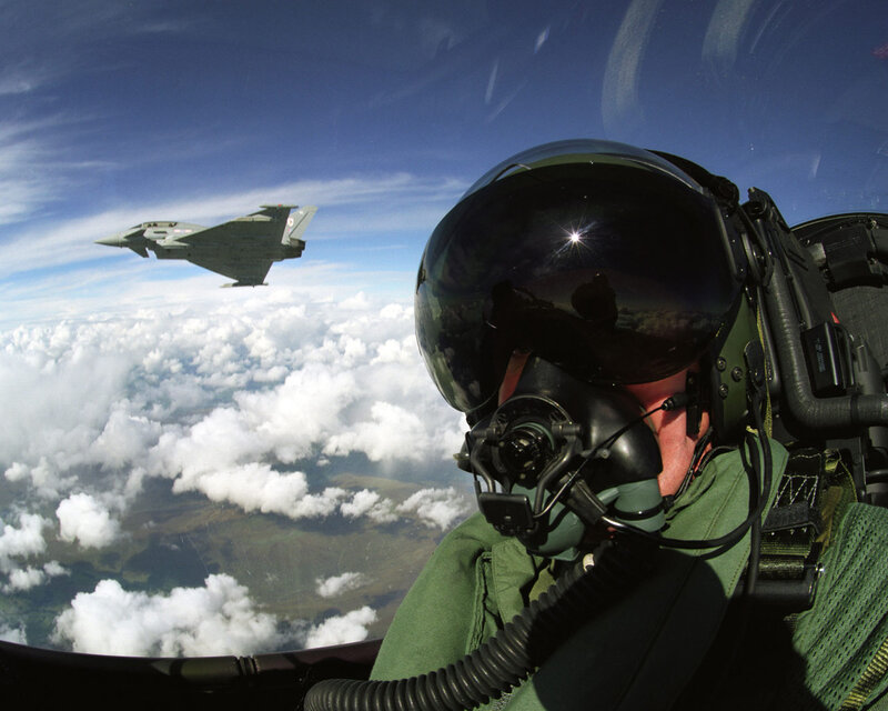 Pilot in Cockpit — Green, Dramatic