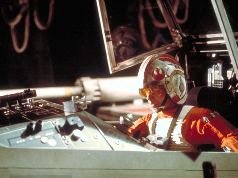pilot in cockpit of starfighter