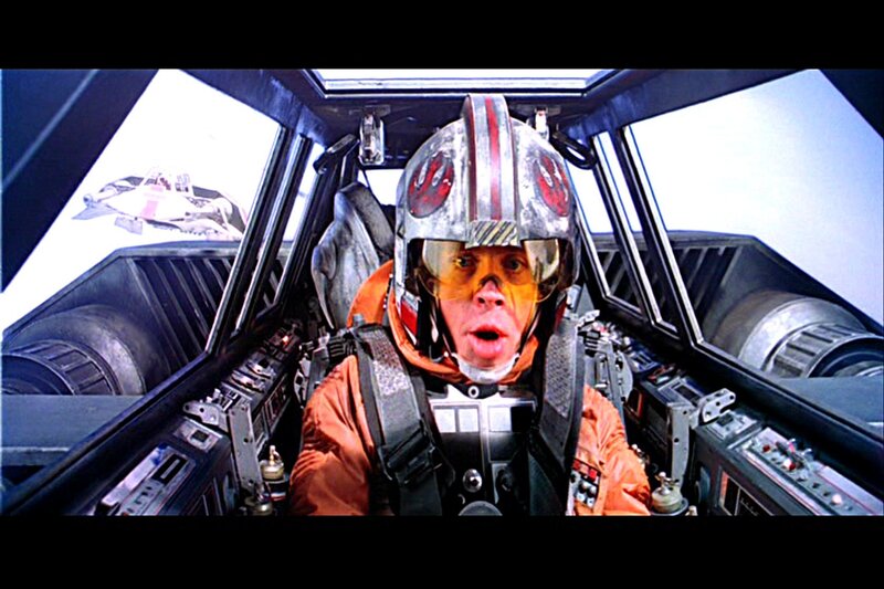pilot in cockpit of starfighter