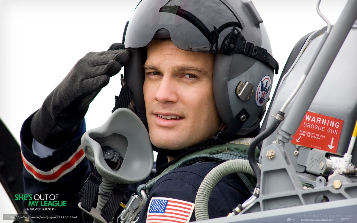 pilot in cockpit saluting