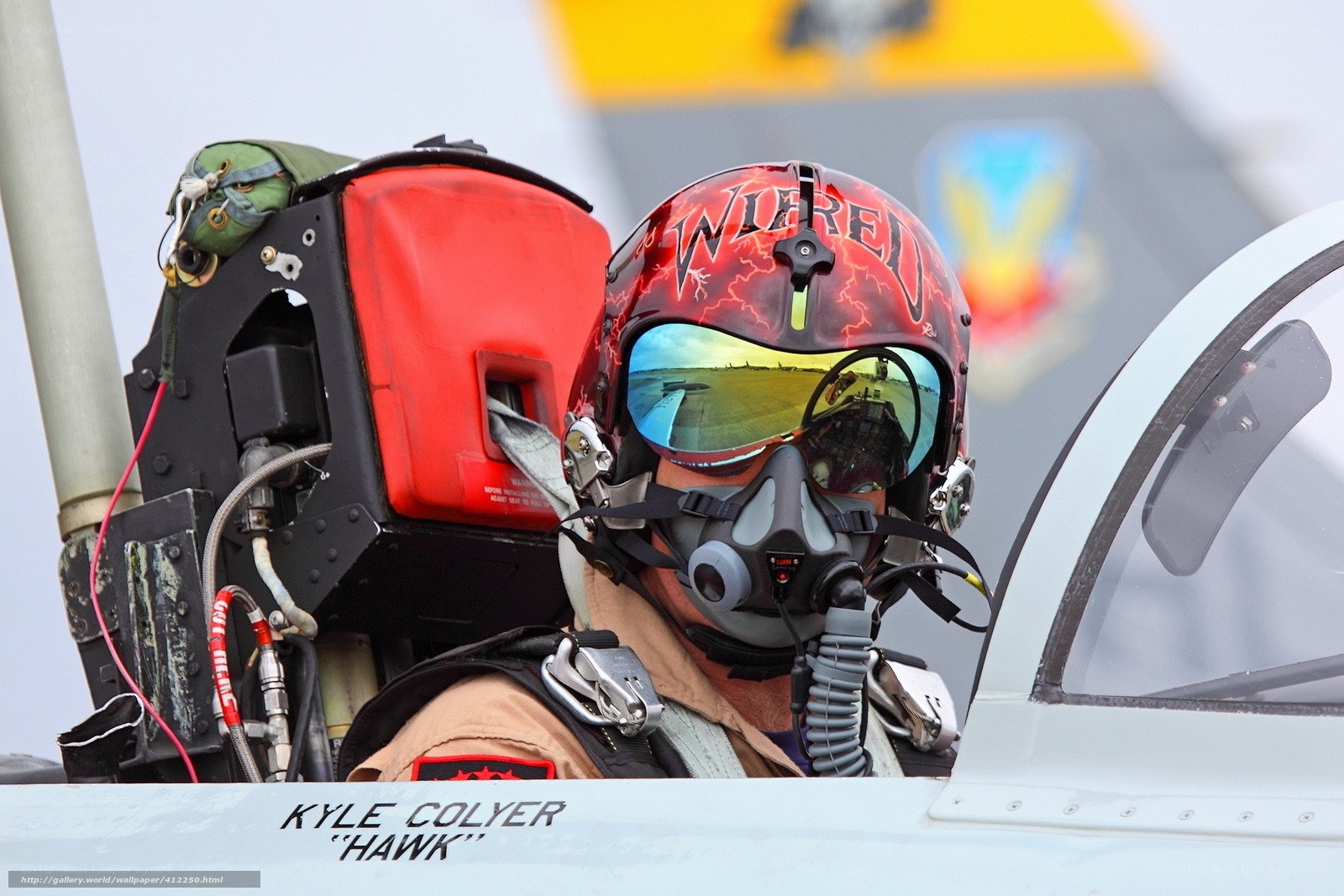 Pilot in cockpit with helmet