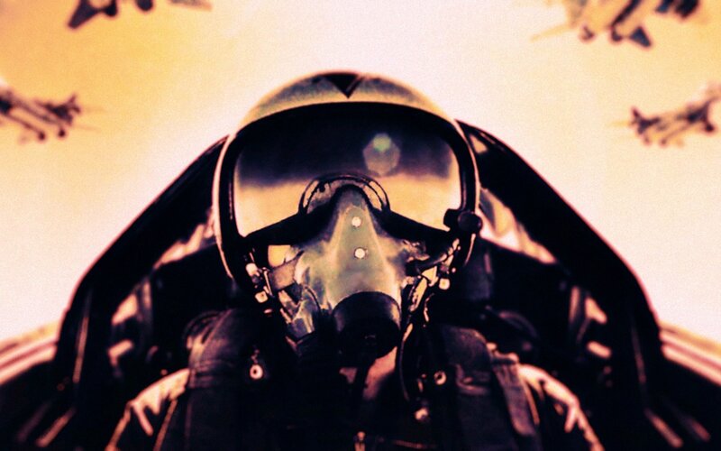 Pilot in Cockpit — Yellow, Dramatic, Sunset, Photograph, Helmet