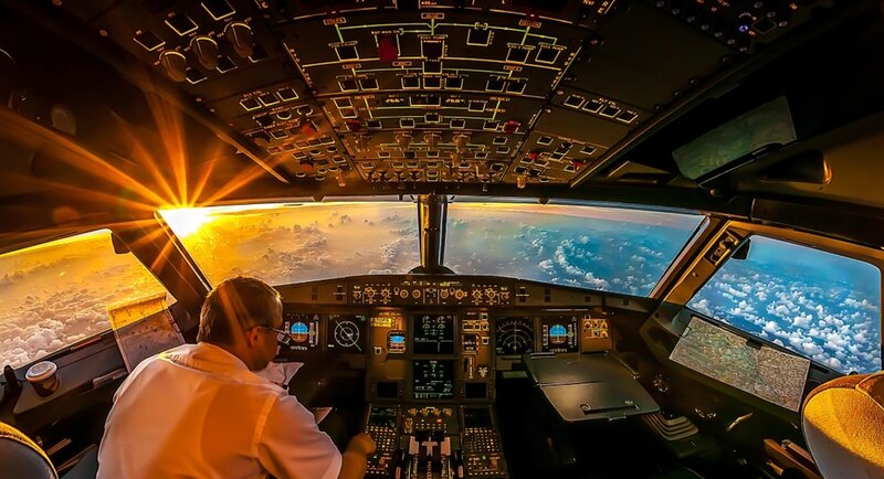 Pilot in Cockpit — Yellow