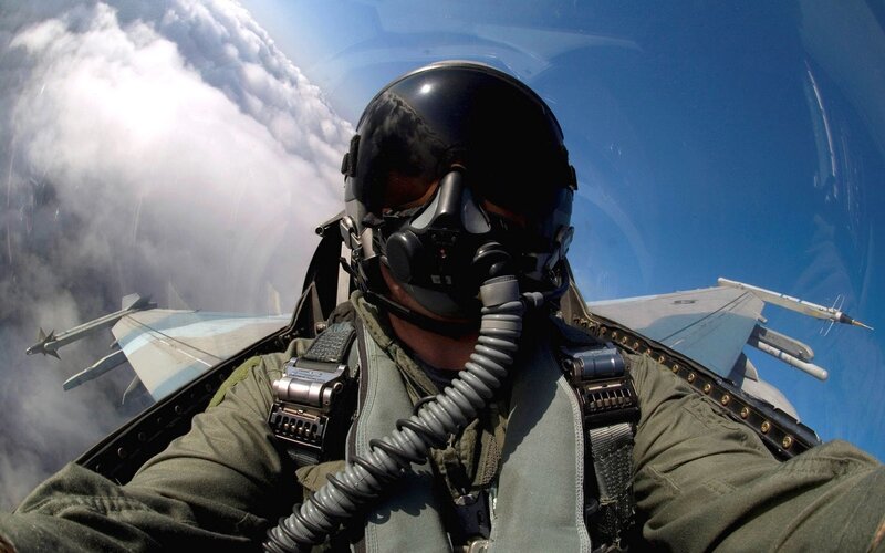 Pilot in Fighter Jet — Blue, Dramatic, Afternoon, Photograph, Helmet
