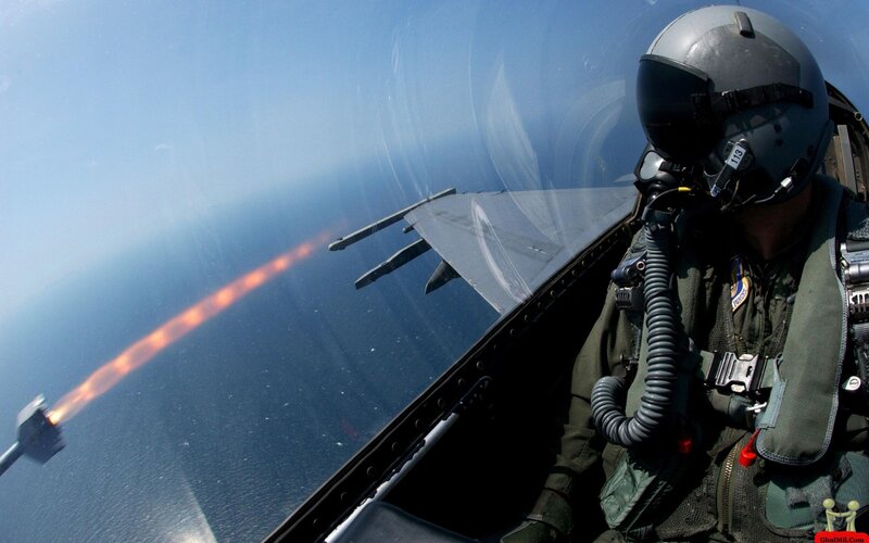Pilot in Fighter Jet — Blue, Dramatic, Afternoon, Photograph, Missile
