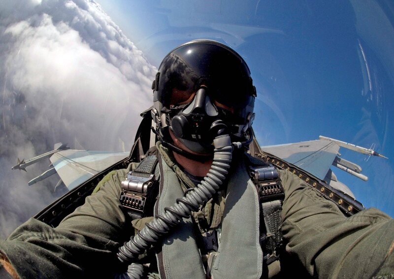 Pilot in Fighter Jet — Blue, Dramatic, Afternoon