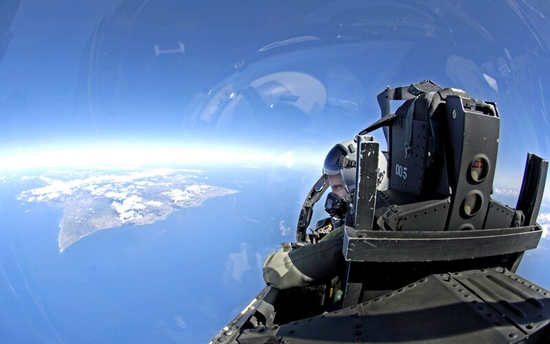 Pilot in Fighter Jet — Blue, Serene