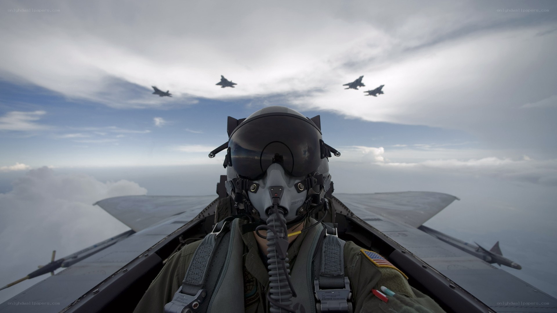 Pilot in fighter jet cockpit
