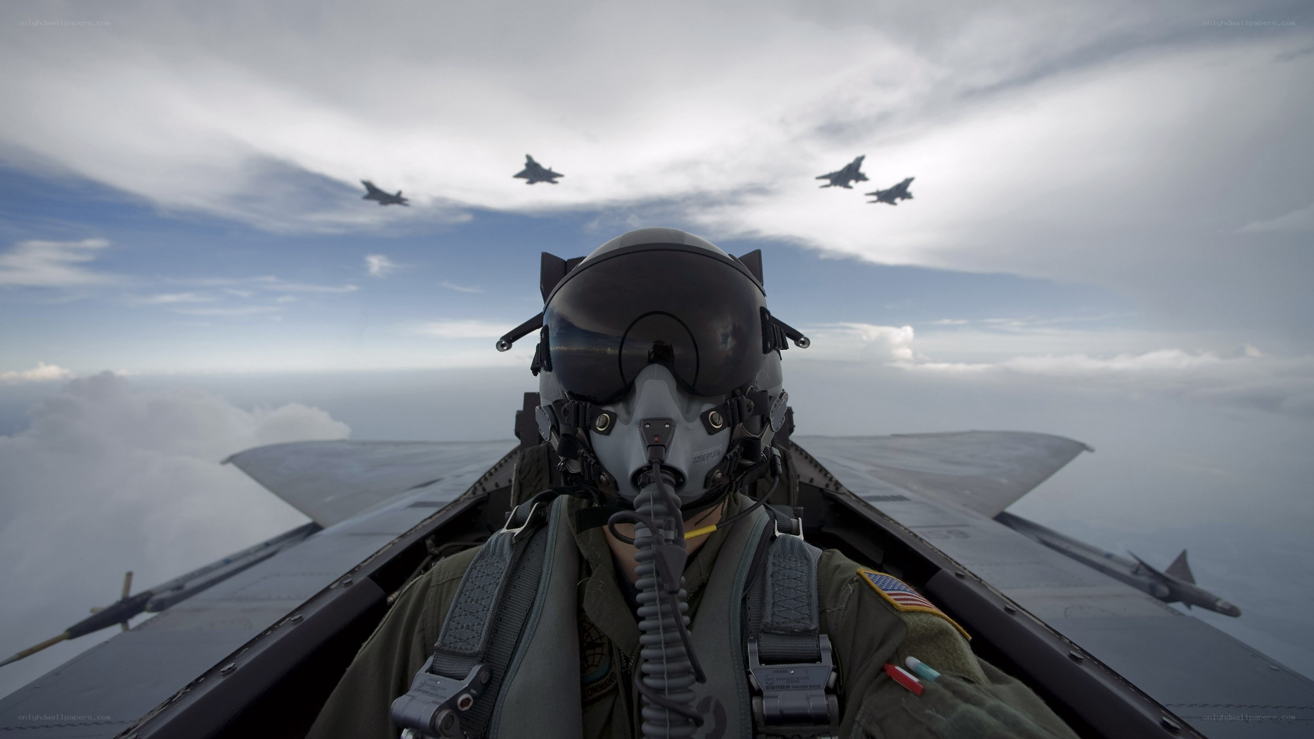 Pilot in fighter jet cockpit