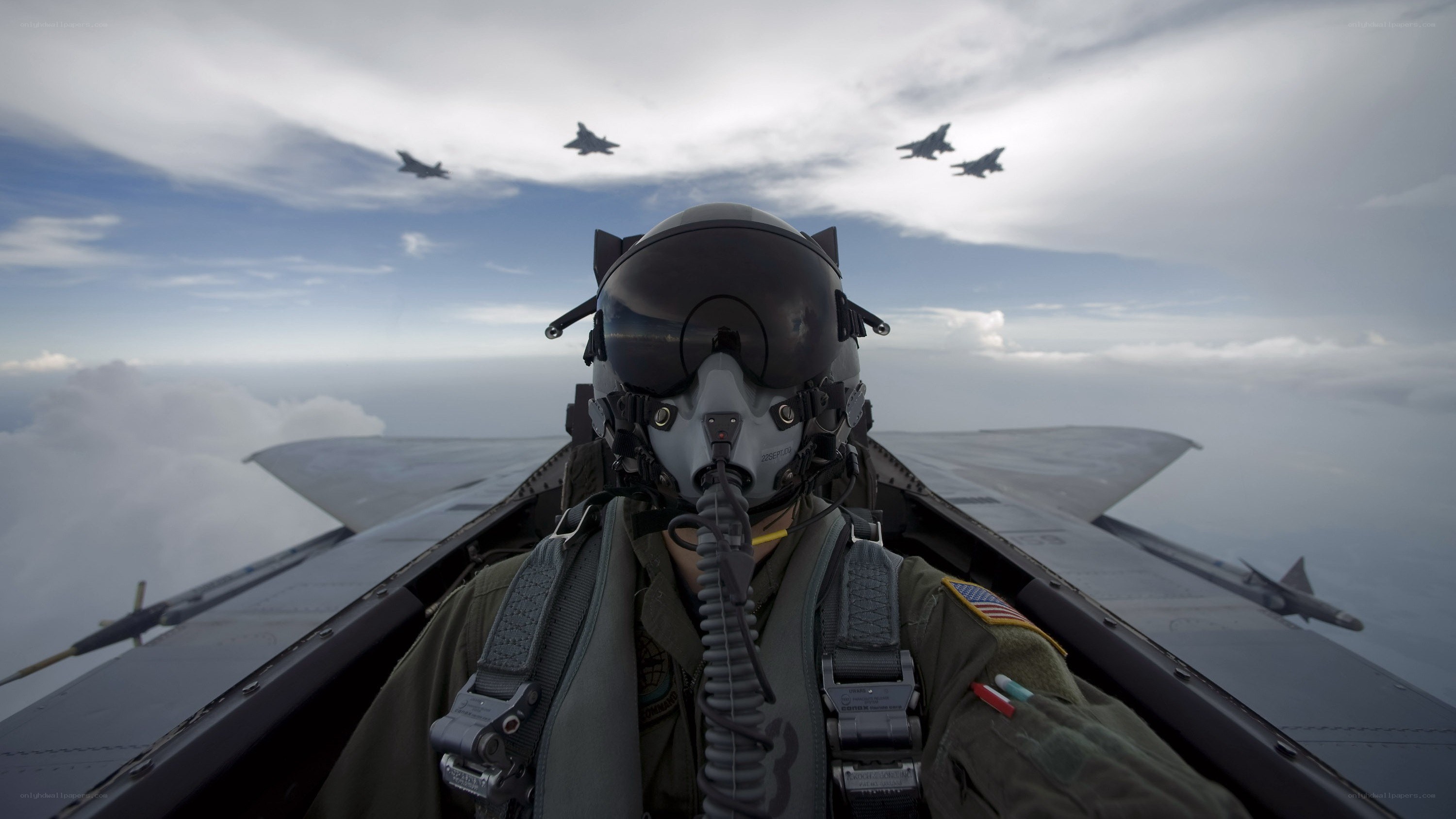 Pilot in fighter jet cockpit