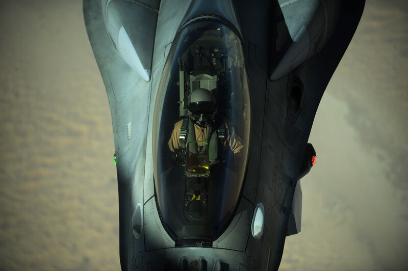 Pilot in Fighter Jet — Gray, Dramatic, Photograph, Cockpit, Black