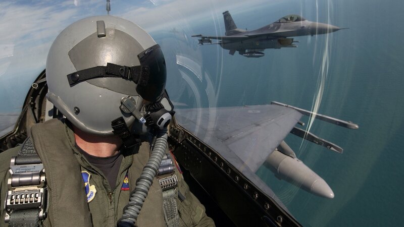 Pilot in Fighter Jet — Gray, Dramatic