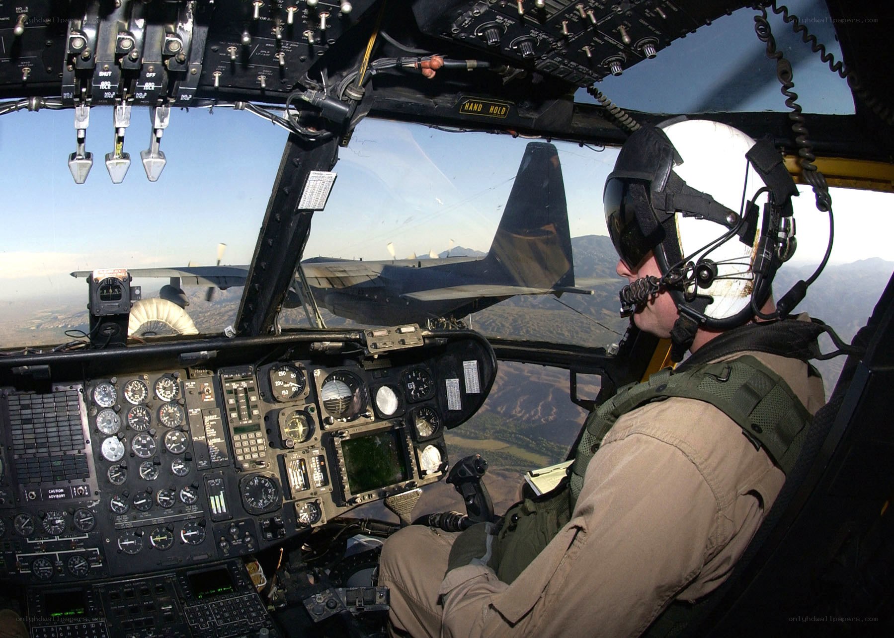 Pilot in helicopter cockpit