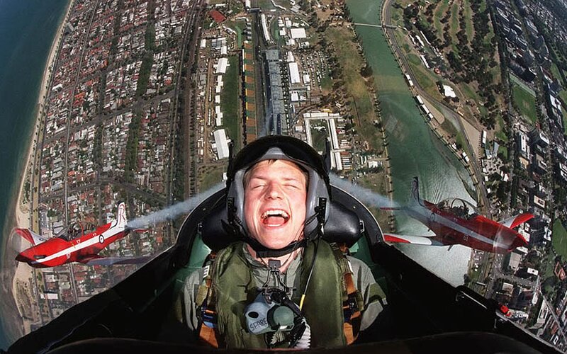 Pilot in Jet Cockpit — Green
