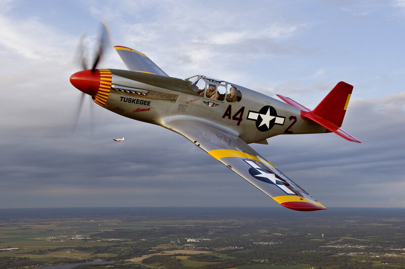 Pilot in Vintage Airplane