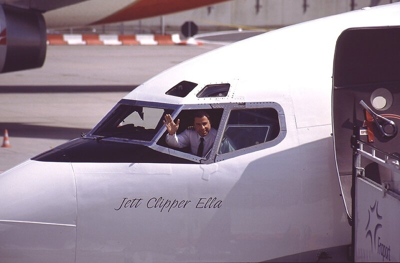 Pilot waving from cockpit
