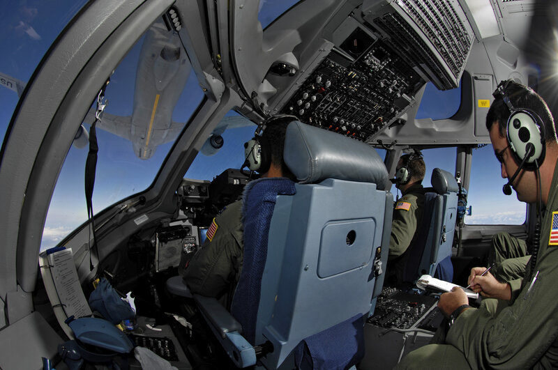 Pilots in aircraft cockpit