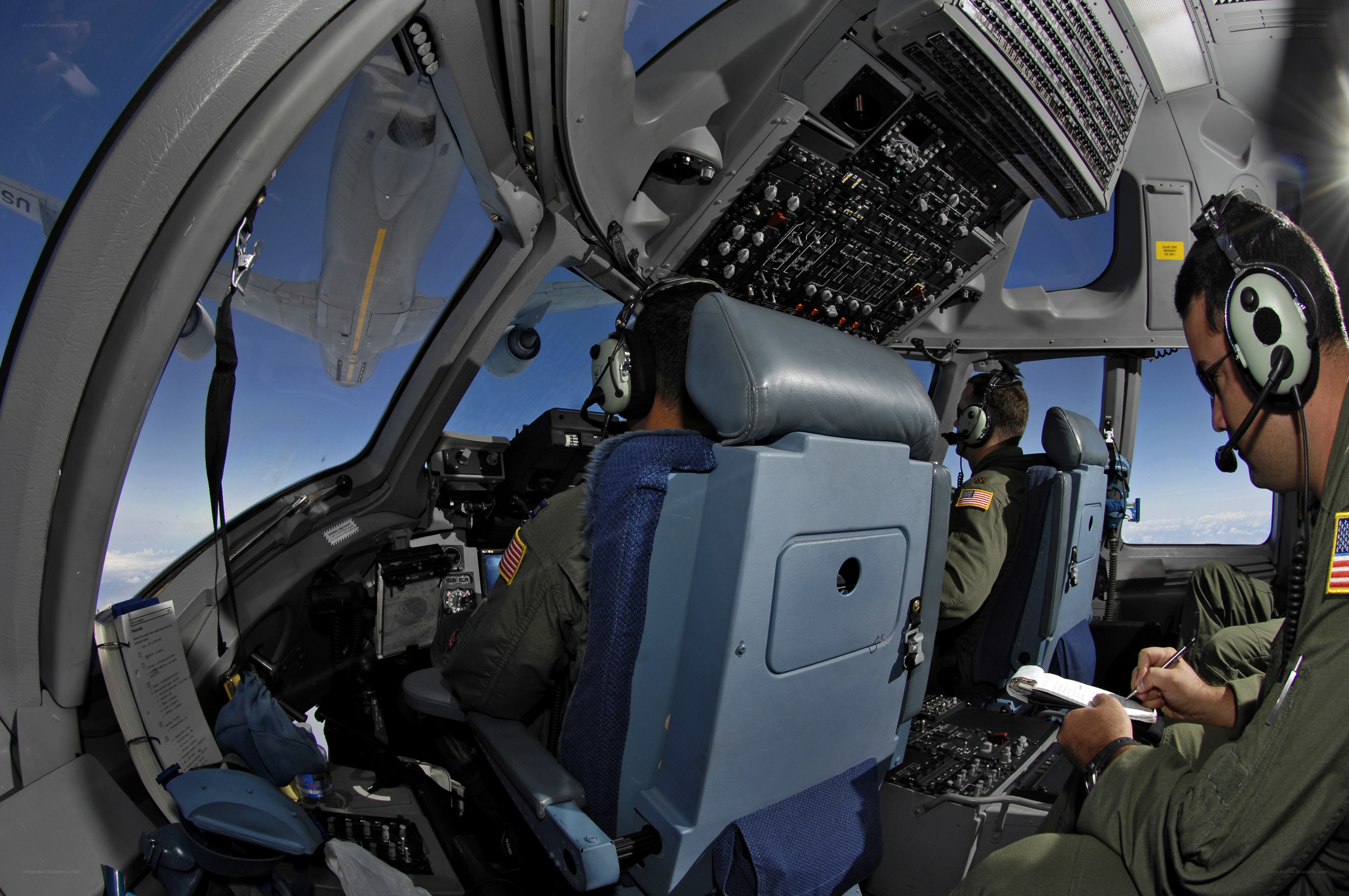 Pilots in aircraft cockpit