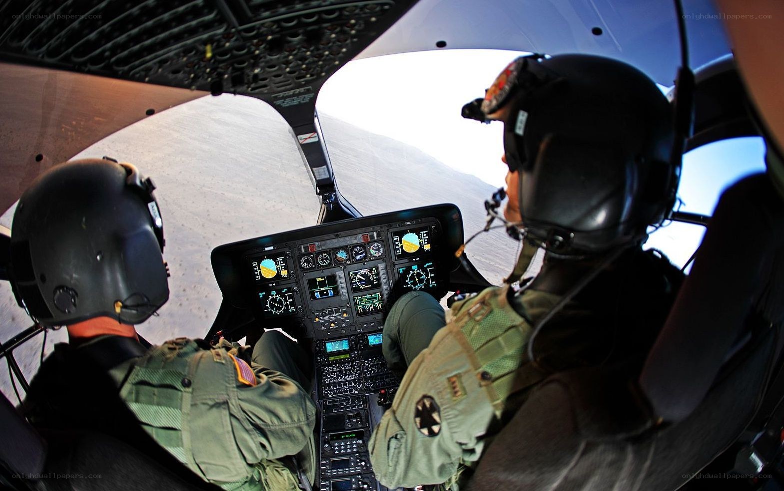 Pilots in helicopter cockpit