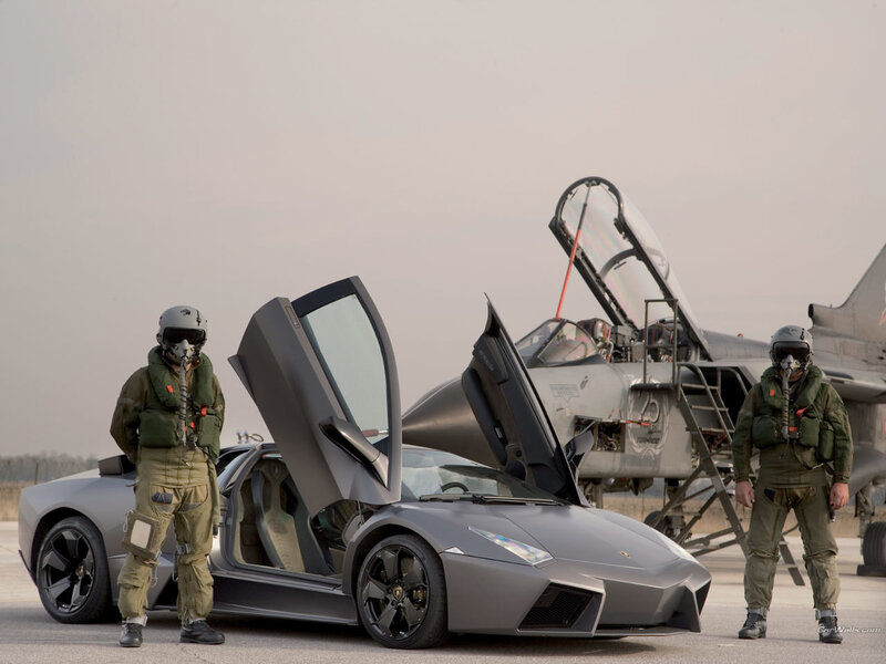 Pilots with Lamborghini and fighter jet