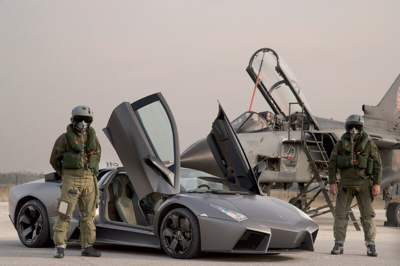 Pilots with Sports Car — Gray, Dramatic, Afternoon, Photograph
