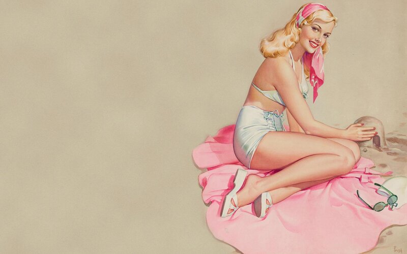 Pin-up girl on beach towel