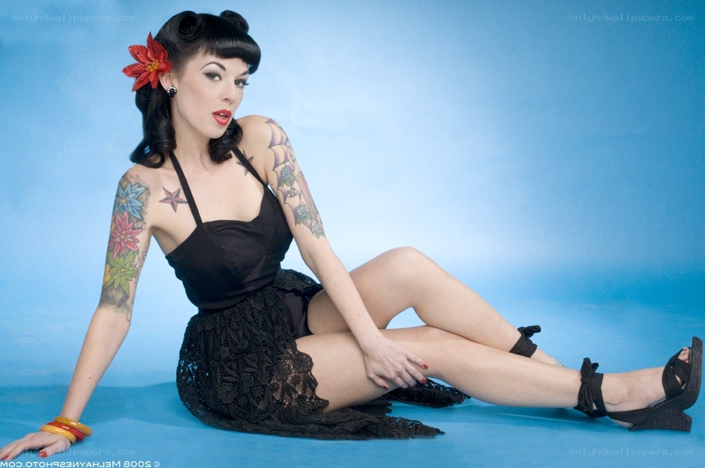 Pin-up model with tattoos
