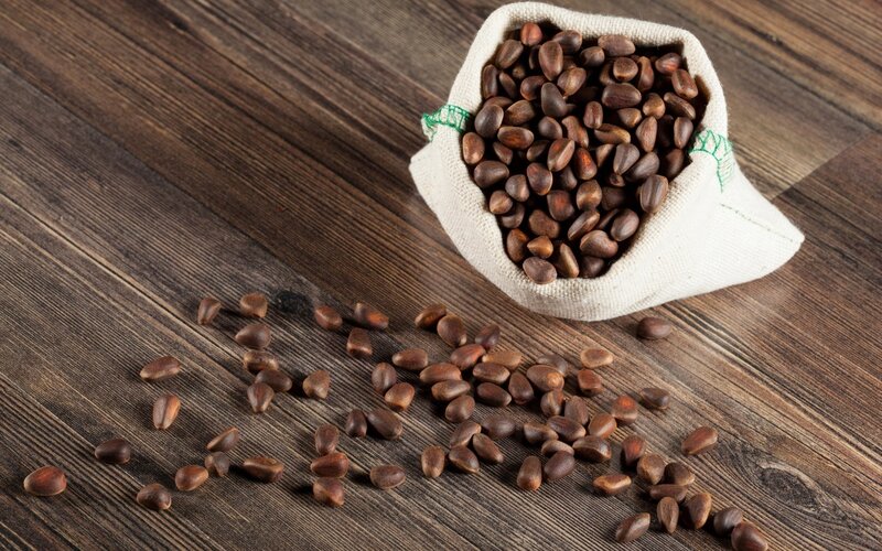 Pine Nuts in a Sack — Brown