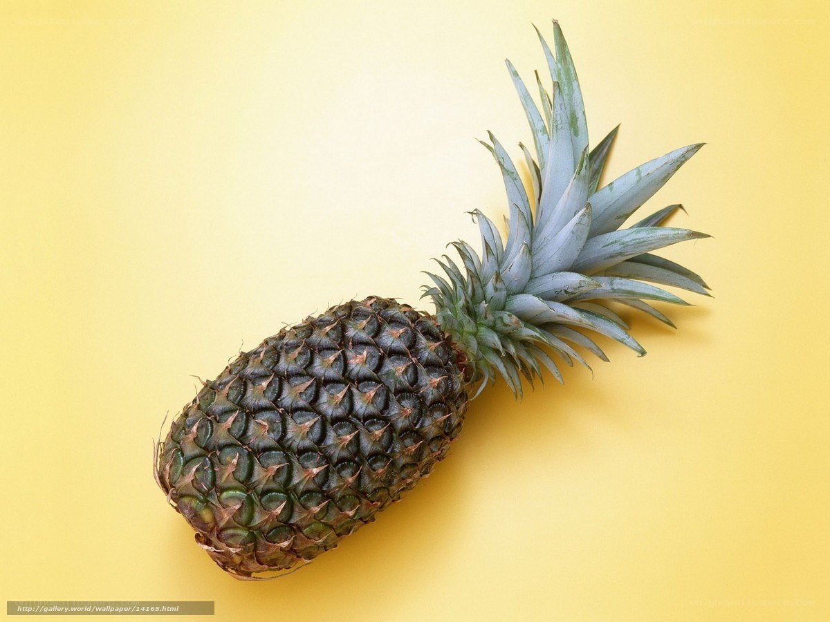 Pineapple on yellow background