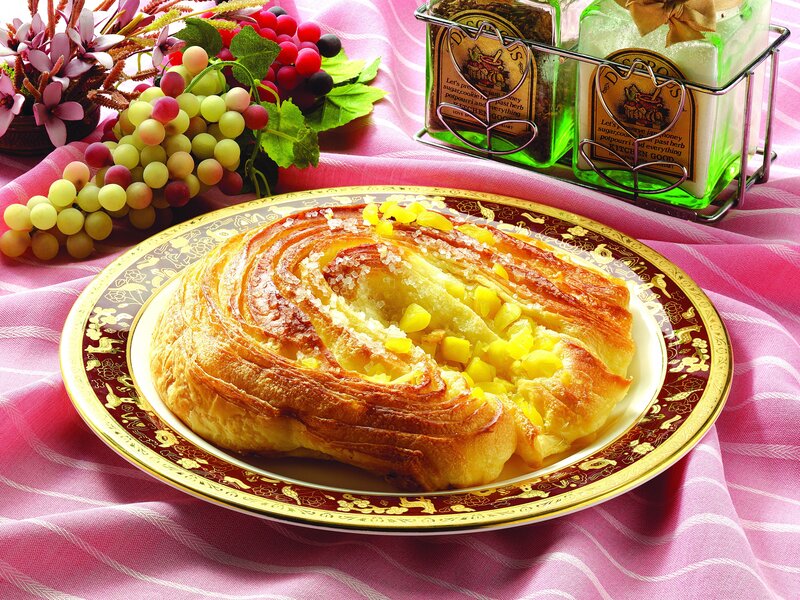 Pineapple pastry on ornate plate