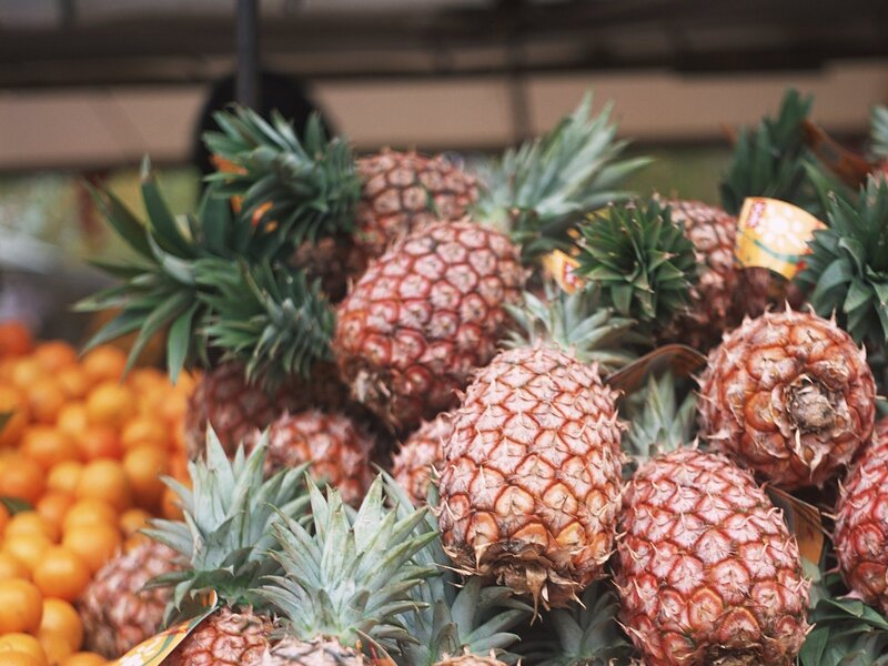 Pineapples at a fruit stand
