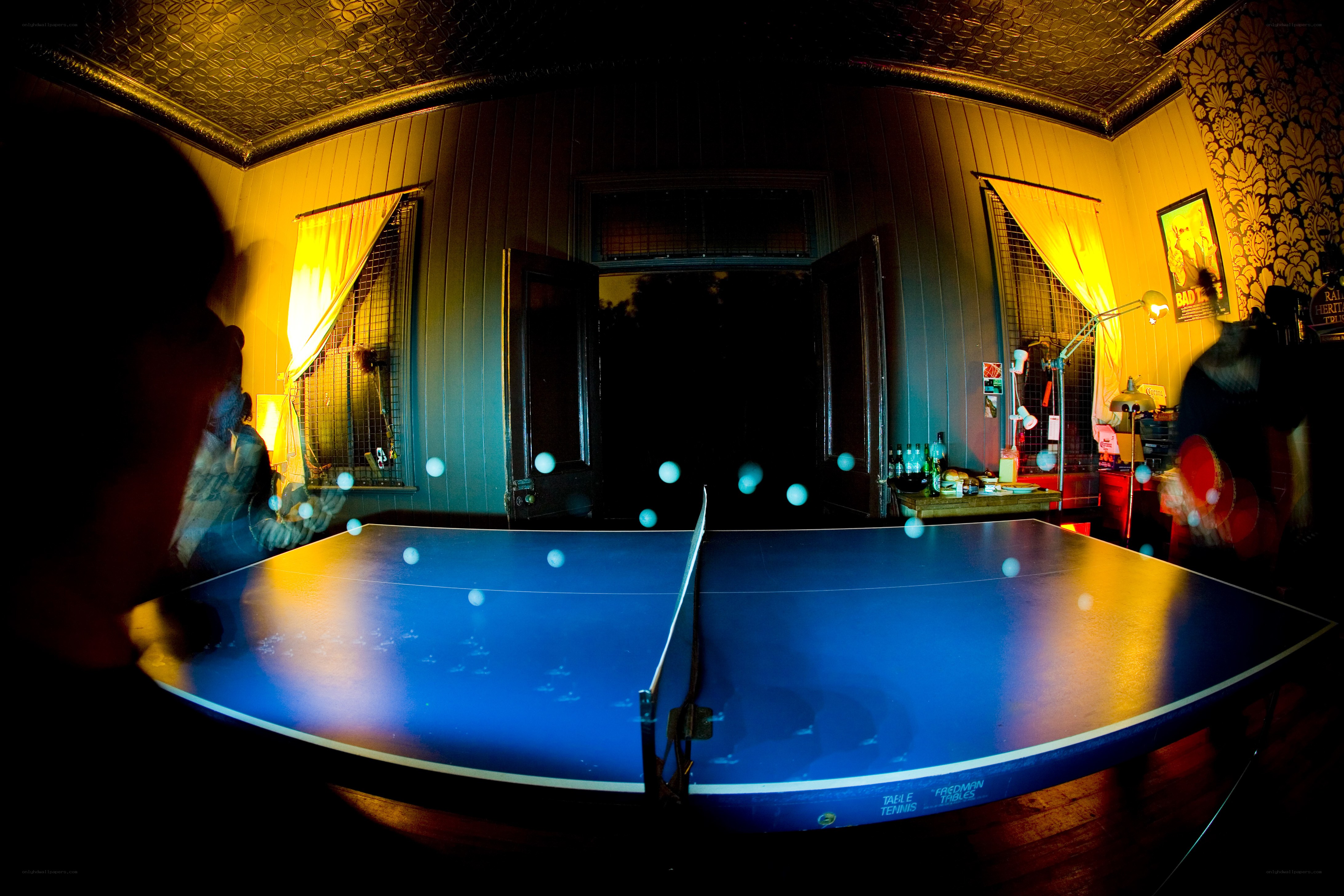 Ping pong in a dimly lit room