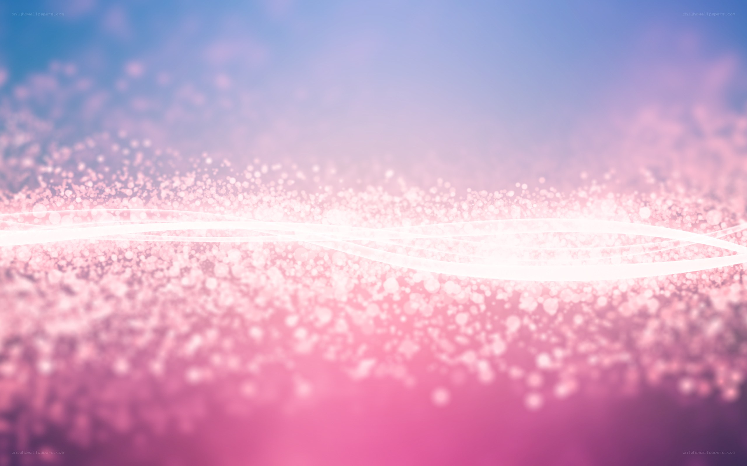 pink and blue particle waves
