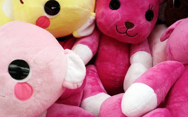 Pink and Yellow Stuffed Animals