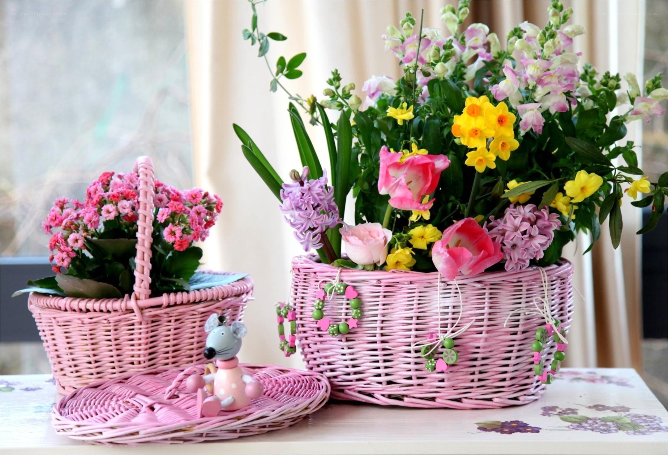 Pink baskets with flowers