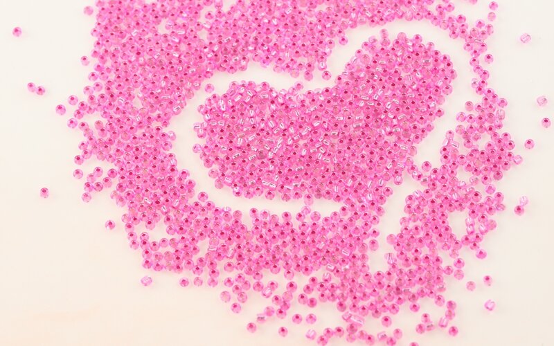 Pink Beads Arranged in Heart